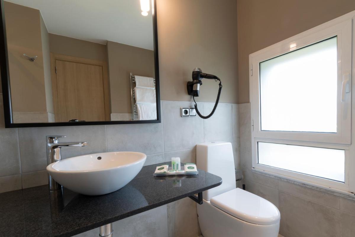 Un baño de Hotel Avenida