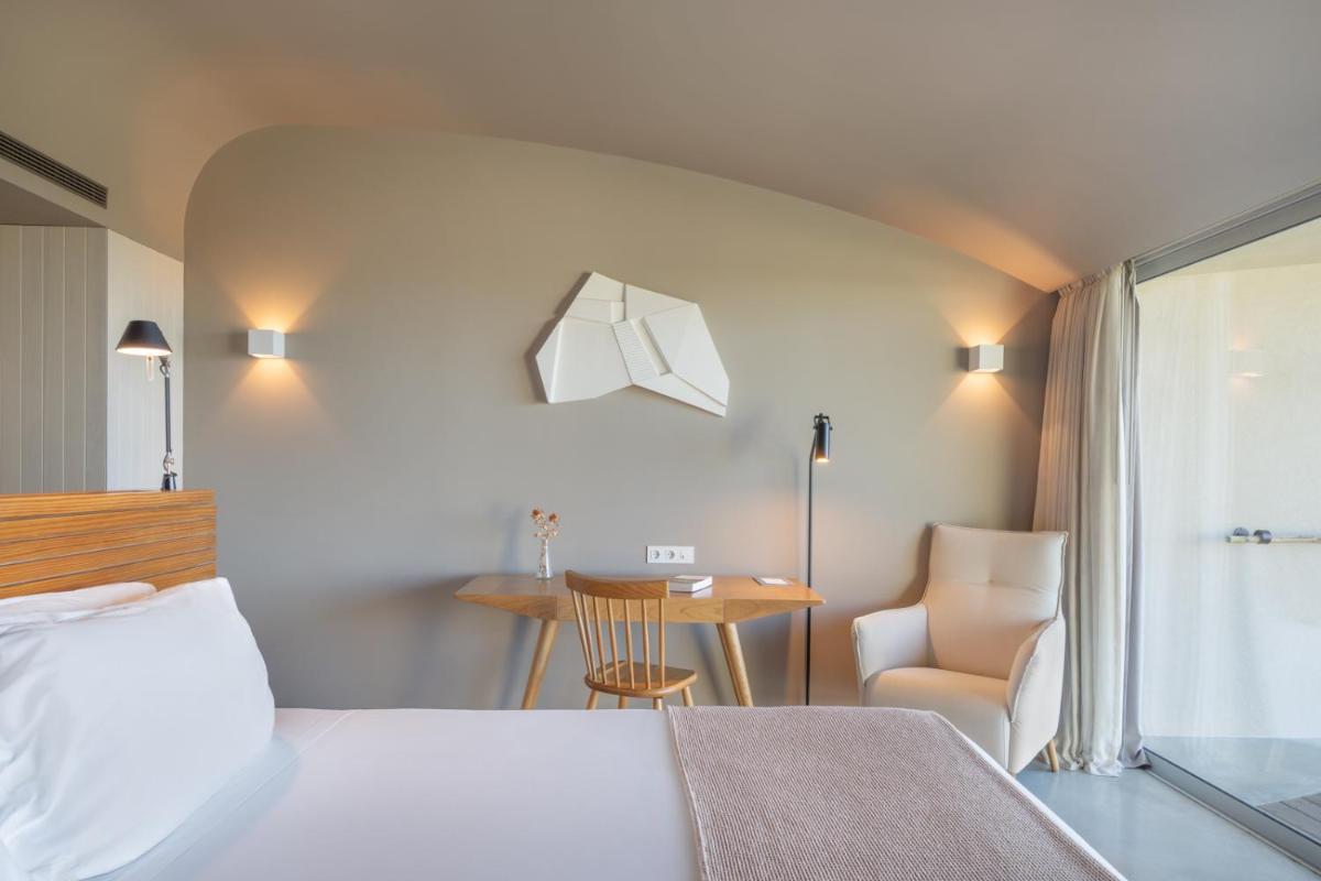 Uma cama ou camas num quarto em Immerso Hotel, a Member of Design Hotels