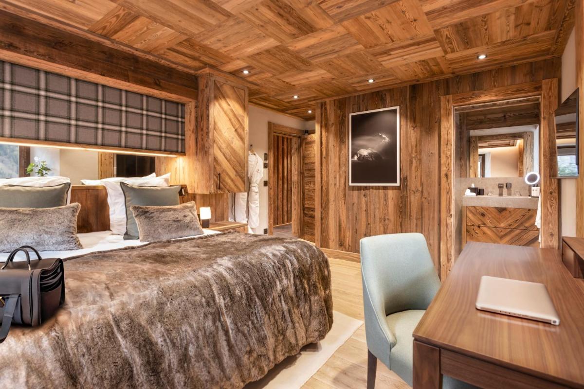 Un ou plusieurs lits dans un hébergement de l'établissement Armancette - The Leading Hotels of the World