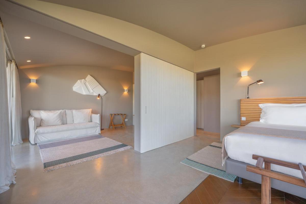 Uma cama ou camas num quarto em Immerso Hotel, a Member of Design Hotels