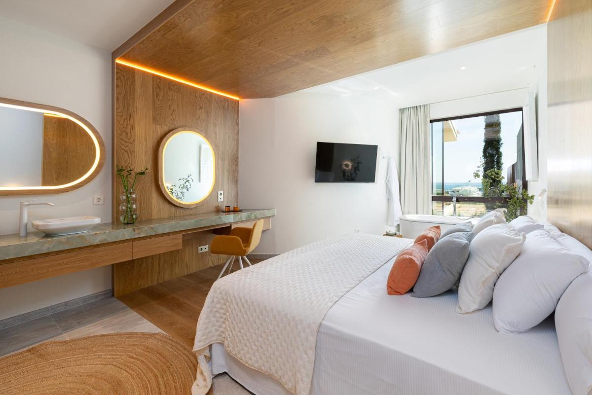 Cama o camas de una habitación en Leiro Residences - Preferred Hotels & Resorts