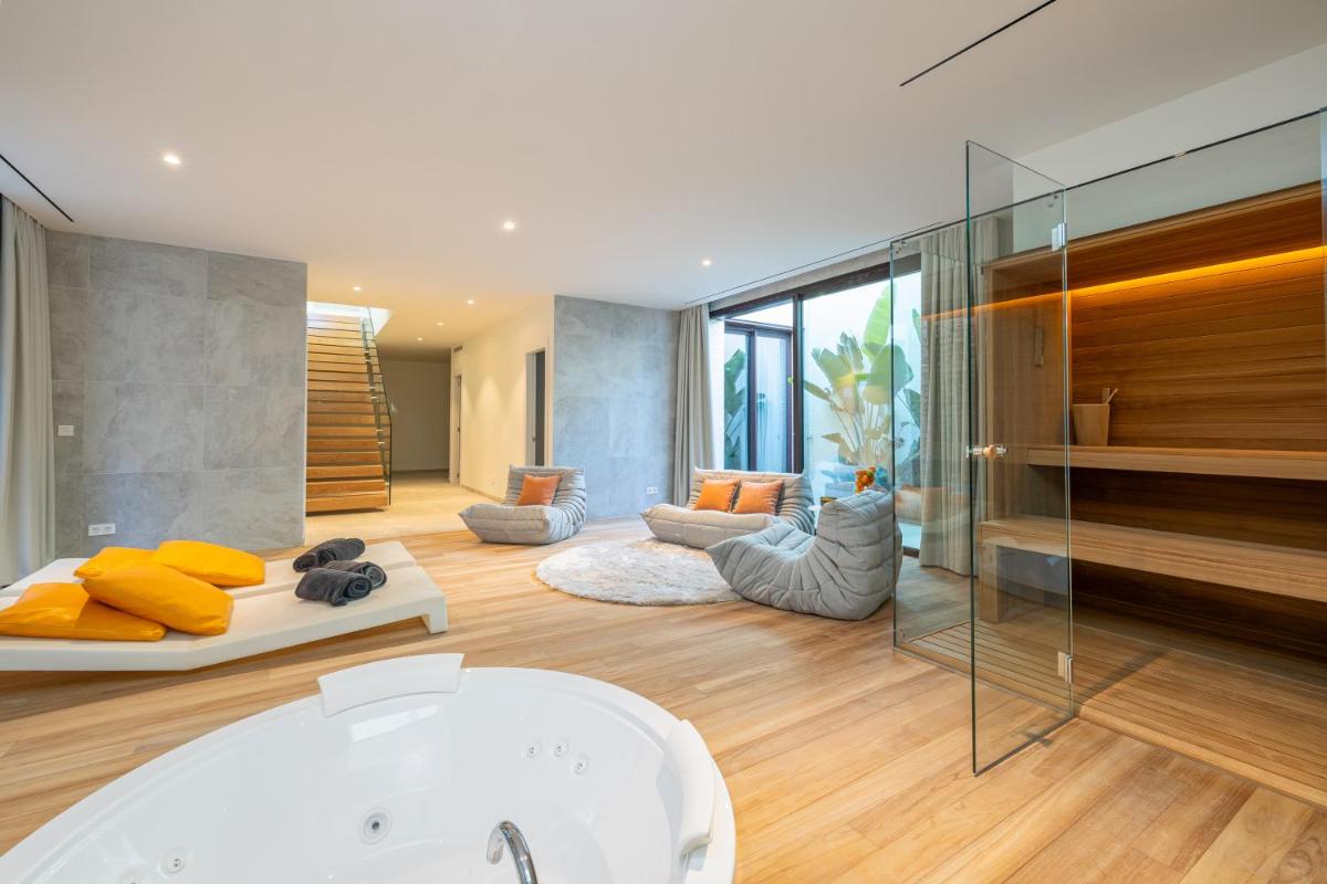 Cama o camas de una habitación en Leiro Residences - Preferred Hotels & Resorts