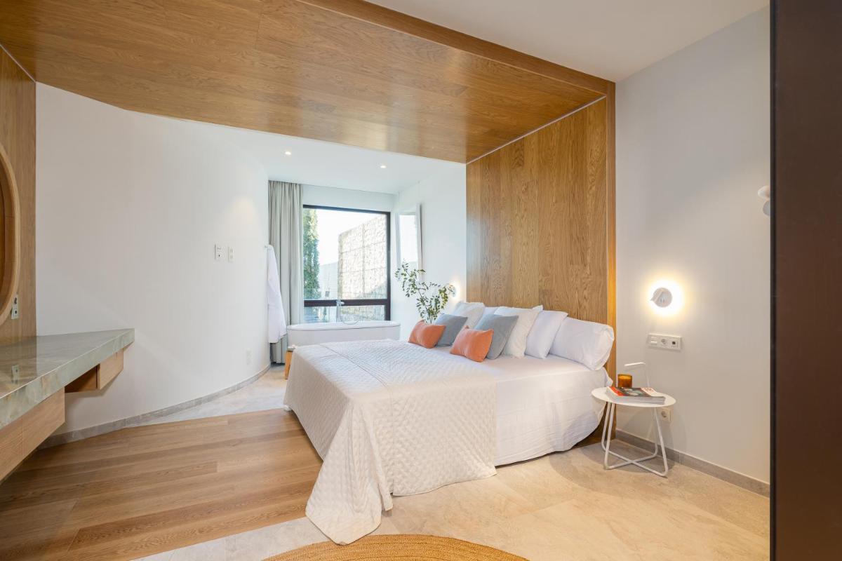 Cama o camas de una habitación en Leiro Residences - Preferred Hotels & Resorts