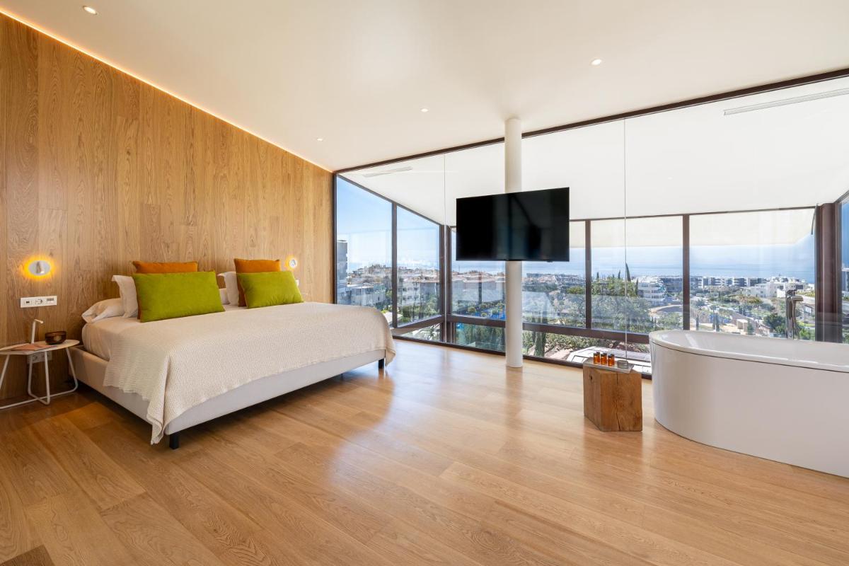 Cama o camas de una habitación en Leiro Residences - Preferred Hotels & Resorts