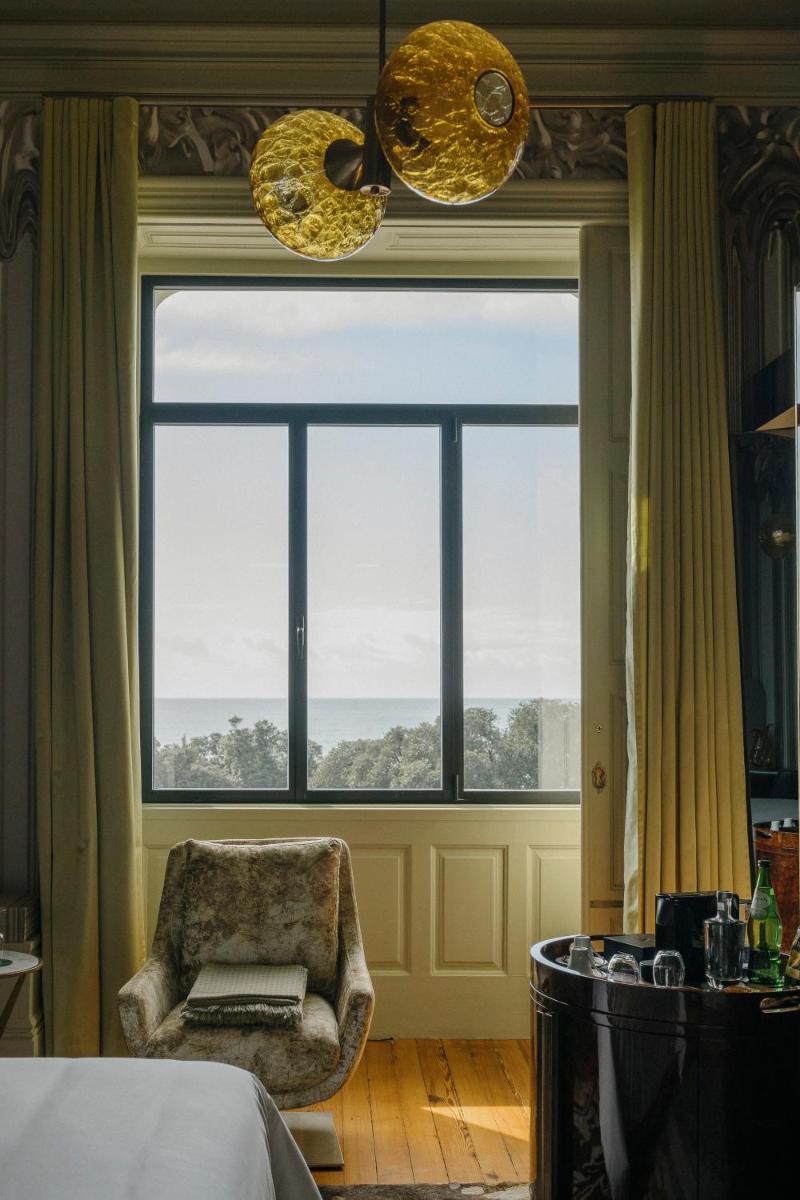 Uma cama ou camas num quarto em Vila Foz Hotel & SPA - member of Design Hotels
