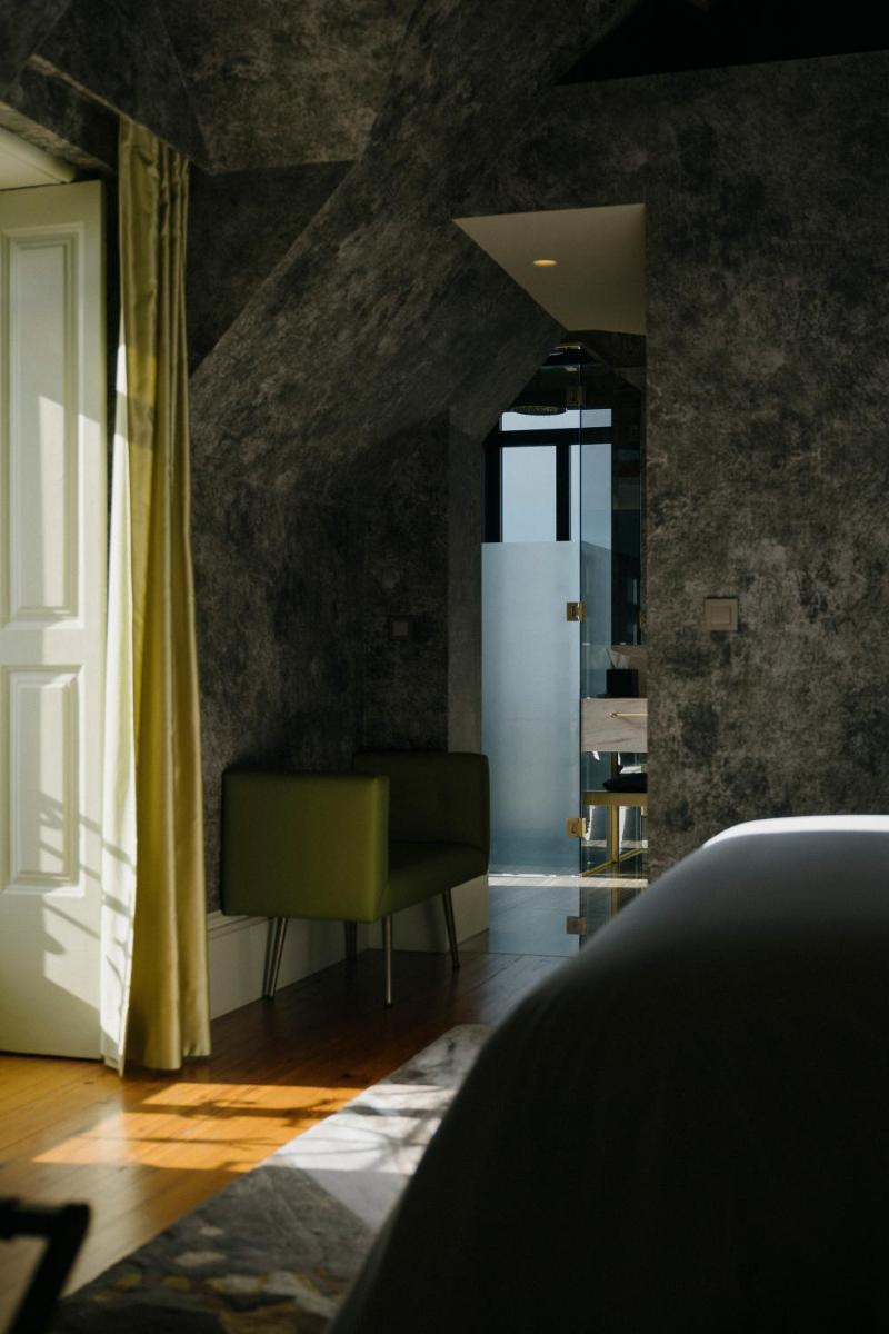 Uma cama ou camas num quarto em Vila Foz Hotel & SPA - member of Design Hotels
