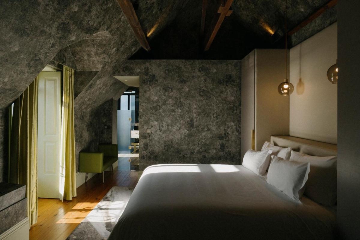 Uma cama ou camas num quarto em Vila Foz Hotel & SPA - member of Design Hotels