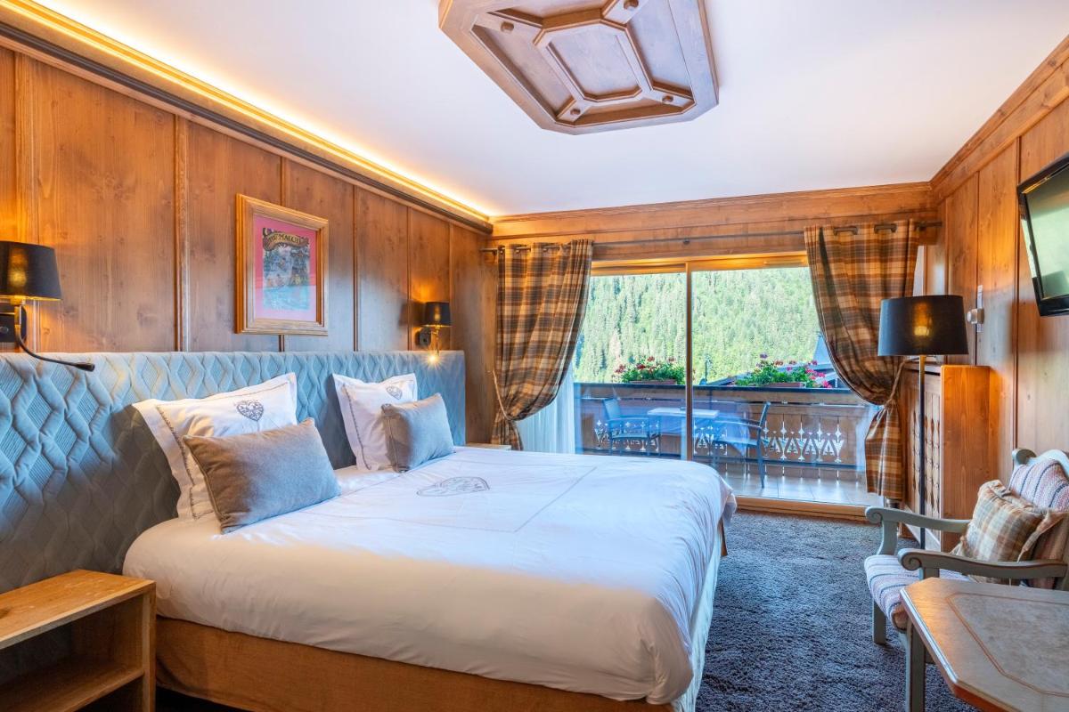 Un ou plusieurs lits dans un hébergement de l'établissement Hôtel Macchi Restaurant & Spa