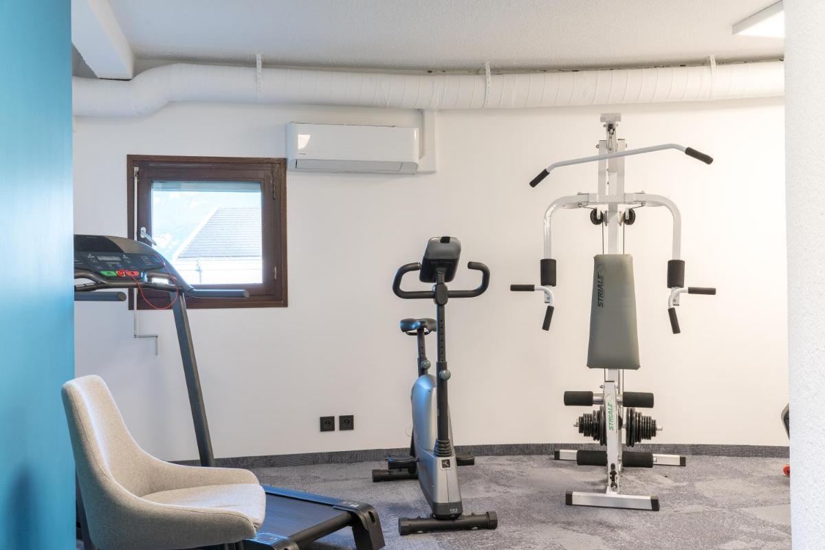 Salle ou équipements de sports de l'établissement PoMo Hôtel & Restaurant
