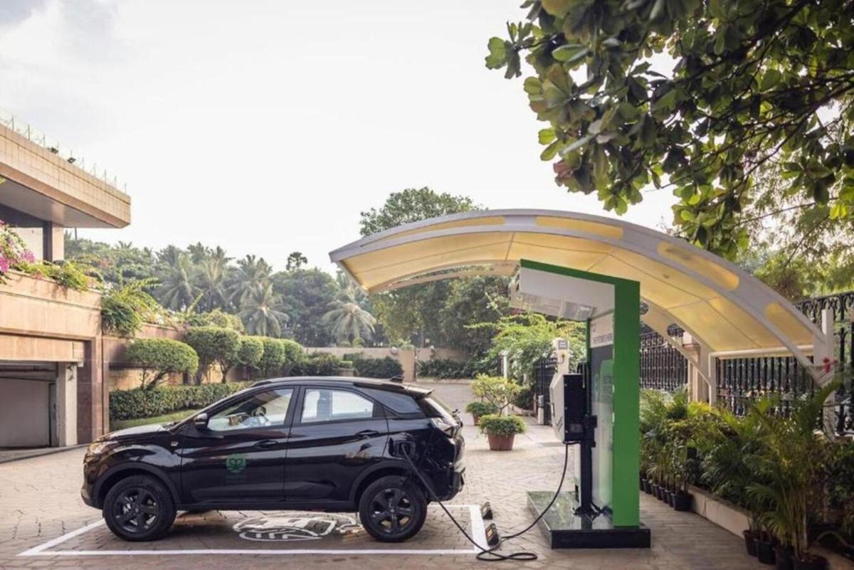 a car is being charged at a gas station at Taj Lands End in Mumbai a car is being charged at a gas station at Taj Lands End in Mumbai