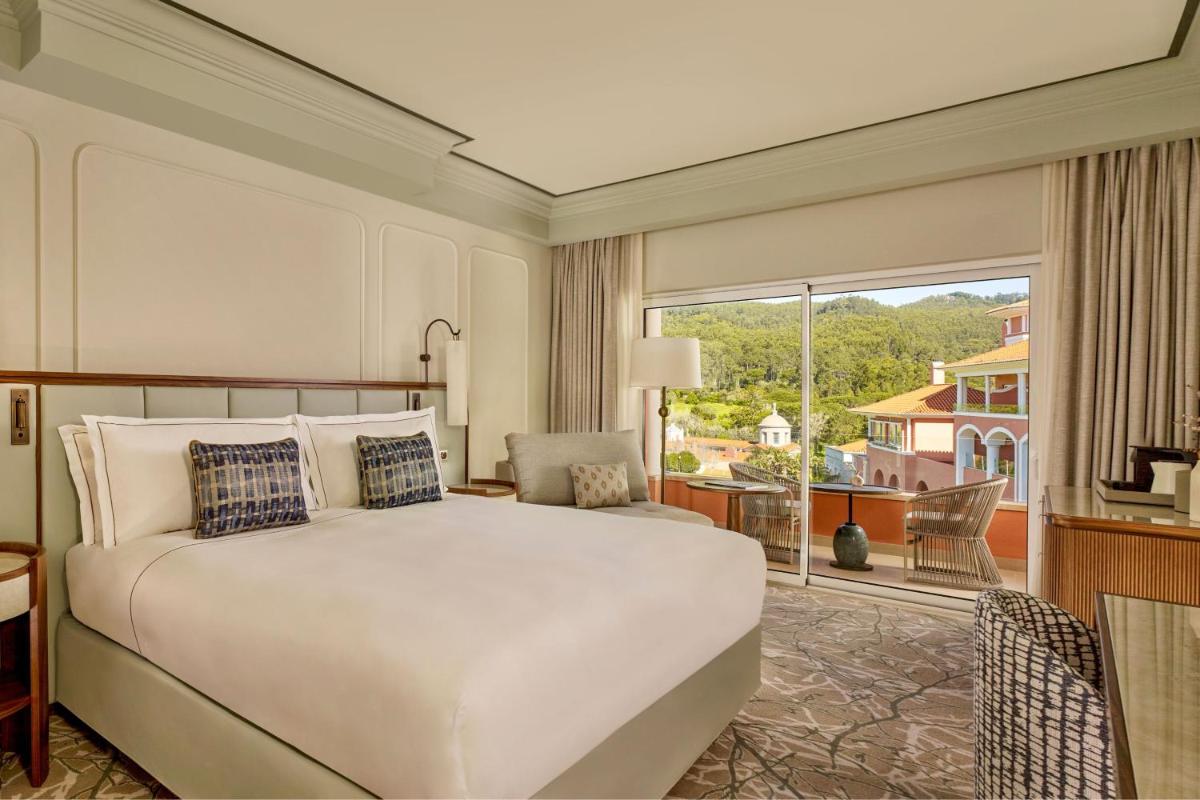 Uma cama ou camas num quarto em Penha Longa Resort