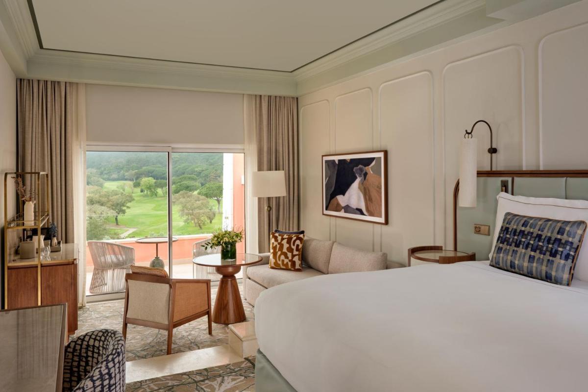 Uma cama ou camas num quarto em Penha Longa Resort