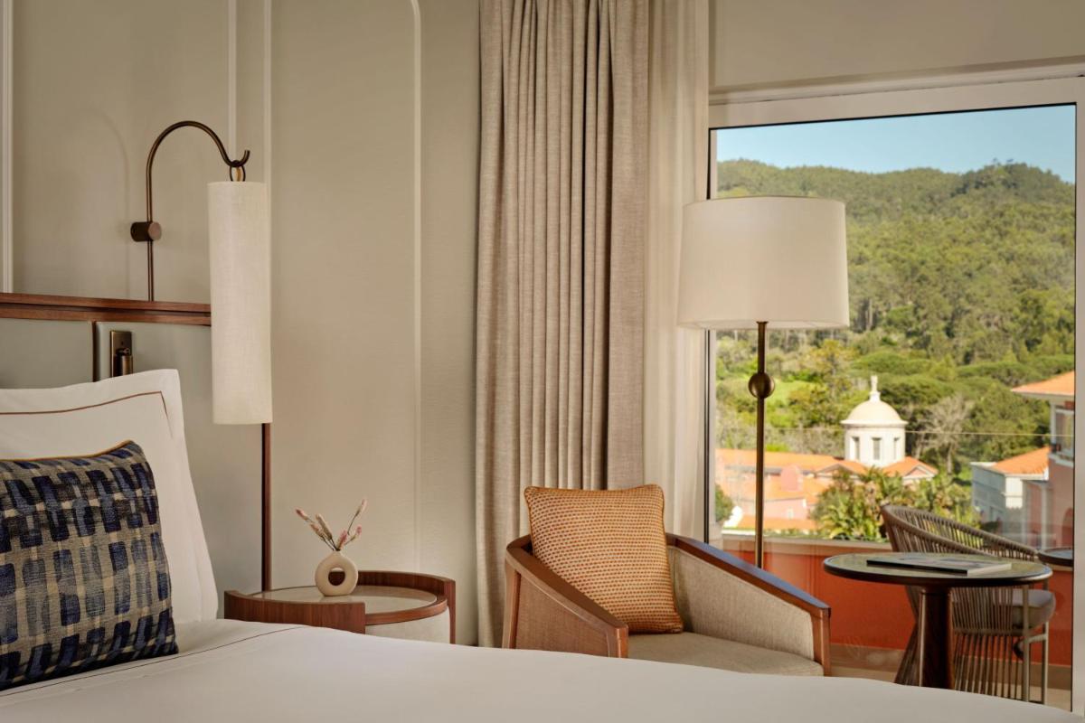 Uma cama ou camas num quarto em Penha Longa Resort