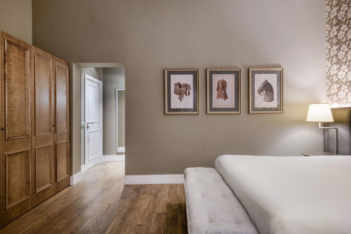 Cama o camas de una habitación en Hotel Palacio del Retiro, Autograph Collection