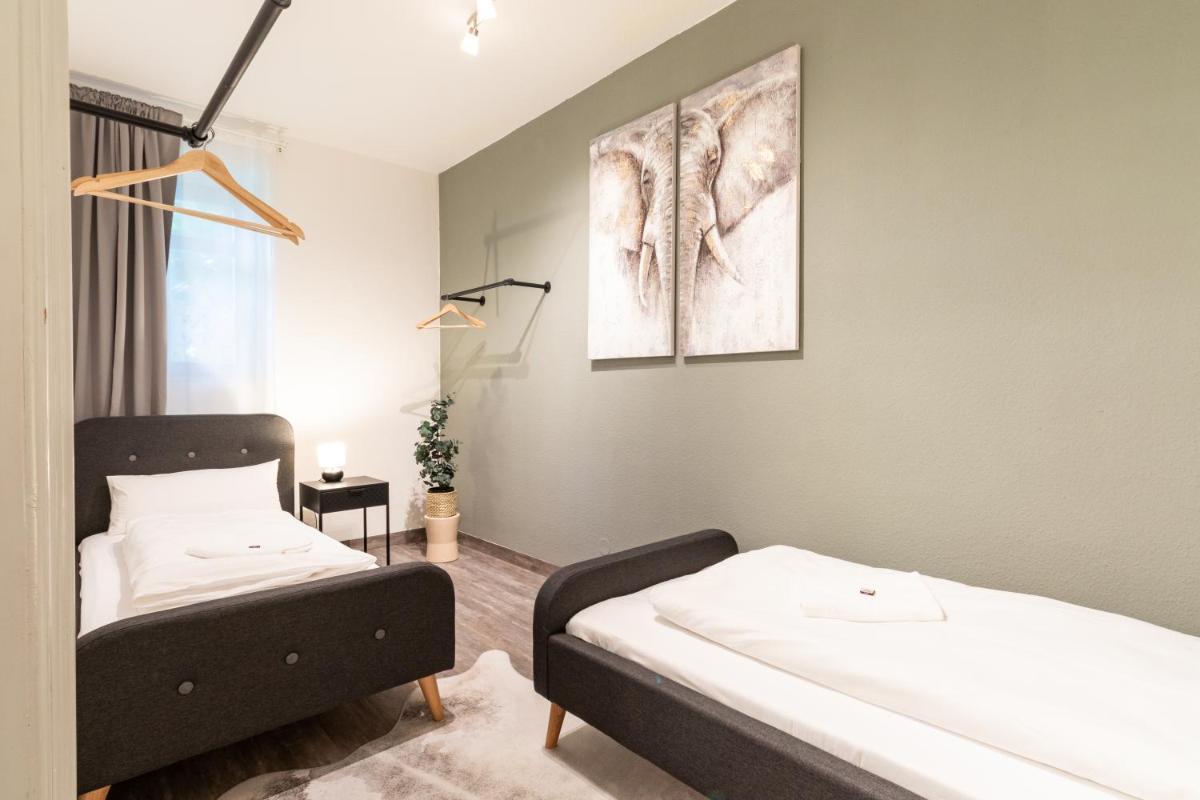 Familienfreundliche Stadt-Oase mit Arbeitsplatz - Bahnhofsnah, 2 Schlafzimmer, 76qm & gratis Kaffee- und Teeangebot - Hizvo