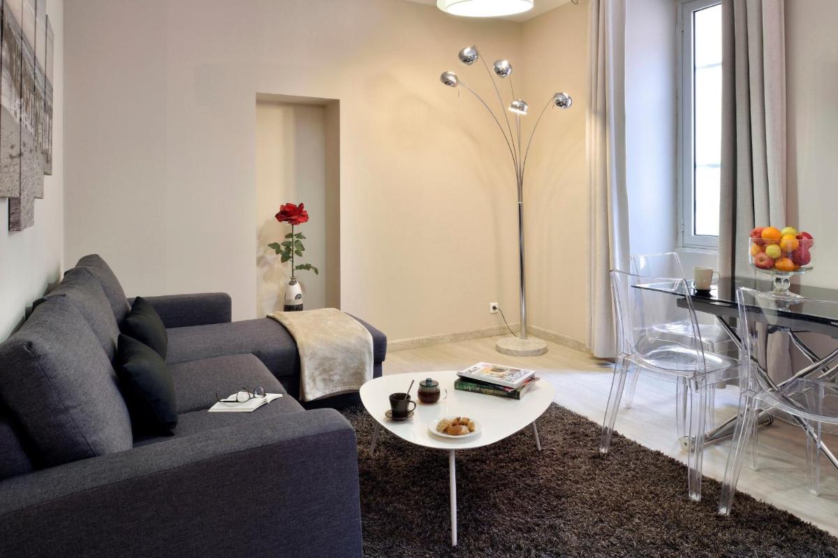 Coin salon dans l'établissement Hôtel Fesch & Spa