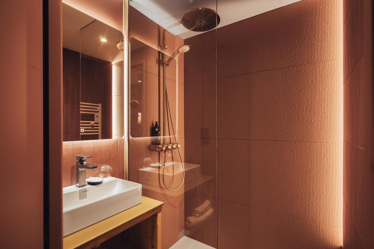 Salle de bains dans l'établissement Alliey & Spa Piscine Appart-hôtel Serre chevalier