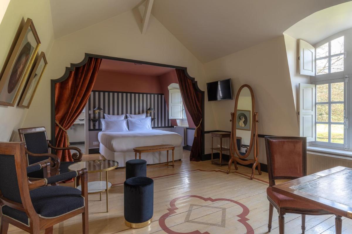 Télévision ou salle de divertissement dans l'établissement Le Château d'Etoges - Champagne