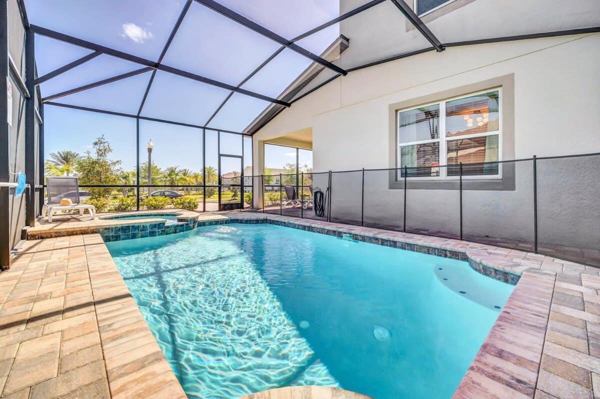 Stunning Villa with Themed Room's and Game Room Right Across From the Club House #7SL9003 - Housity