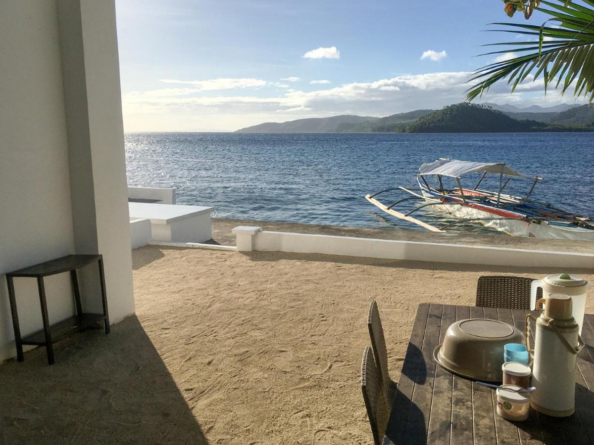Sunset Beach House - On Calintaan Island - Housity