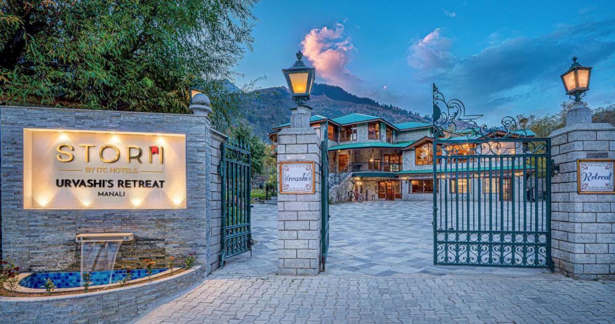 a gate to a house with a sign on it at Storii By ITC Hotels Urvashis Retreat, Manali in Manāli a gate to a house with a sign on it at Storii By ITC Hotels Urvashis Retreat, Manali in Manāli