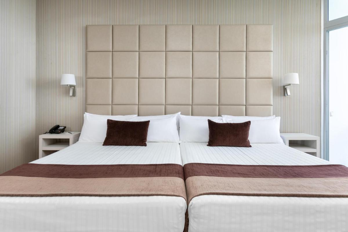 Cama o camas de una habitación en Hotel Best Semiramis