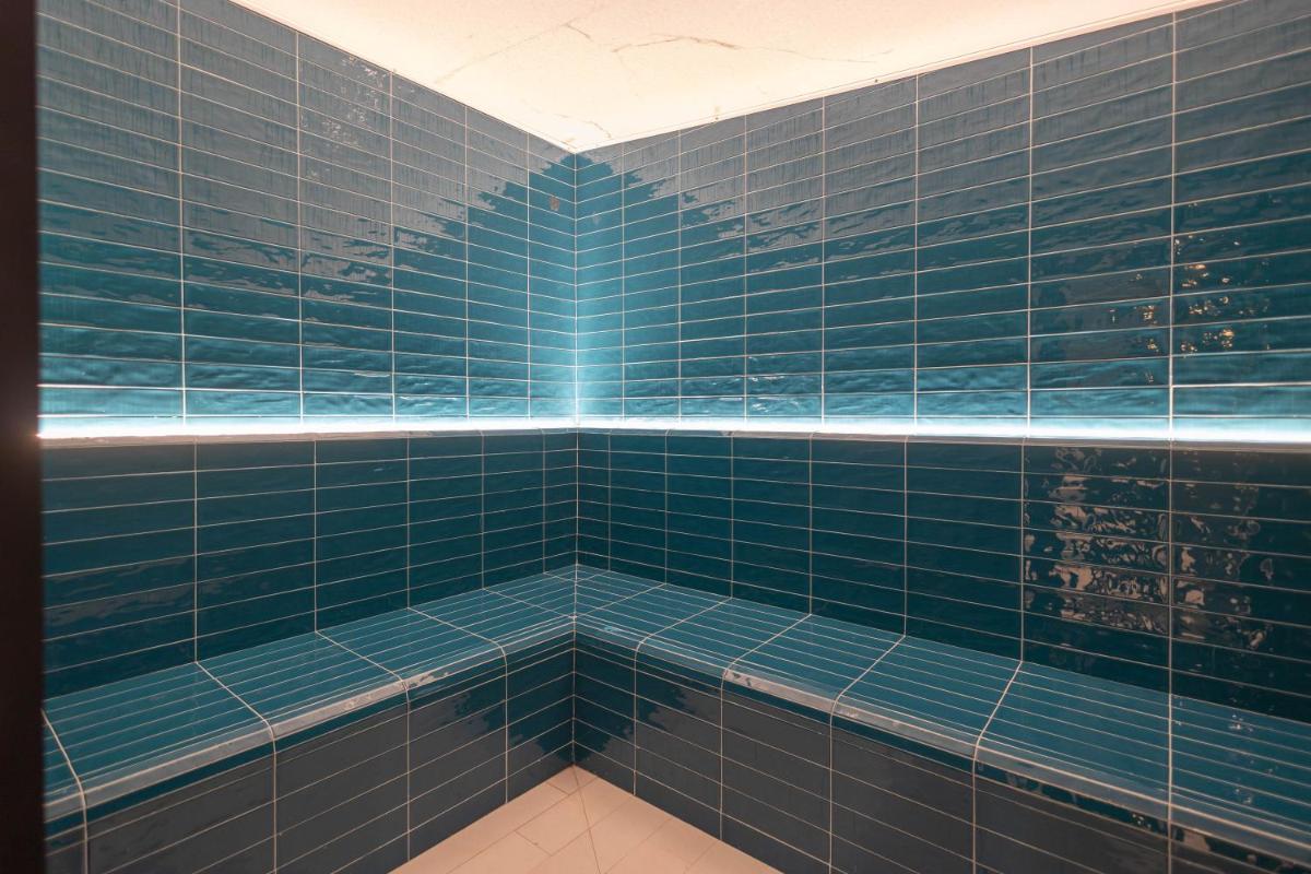 Un baño de Hotel Neptuno Playa & Spa