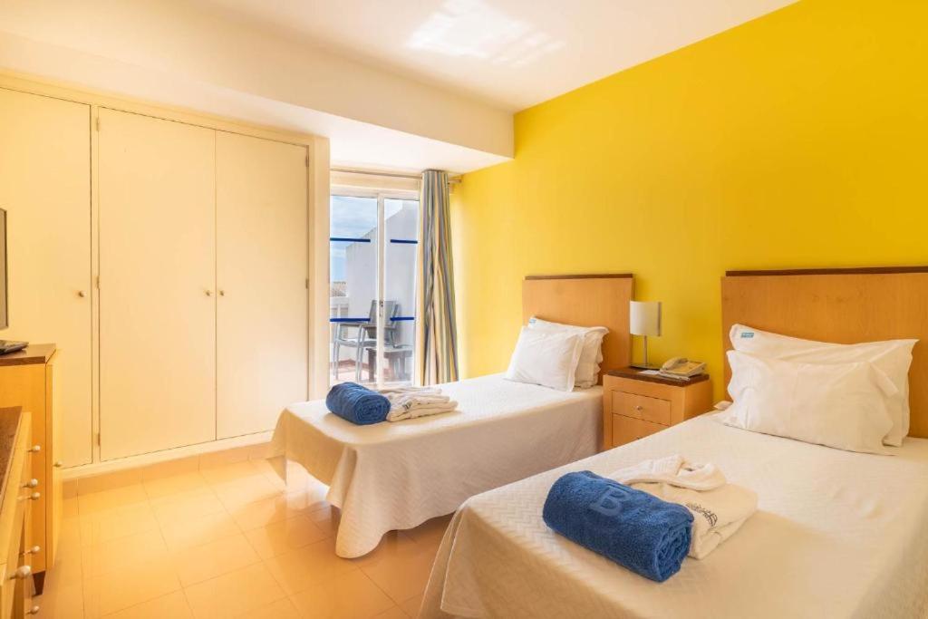 Uma cama ou camas num quarto em Boa Vista Hotel & Spa - Adults Only