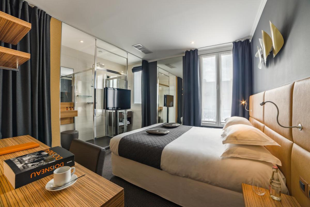 Un ou plusieurs lits dans un hébergement de l'établissement Hotel Residence Europe & Spa