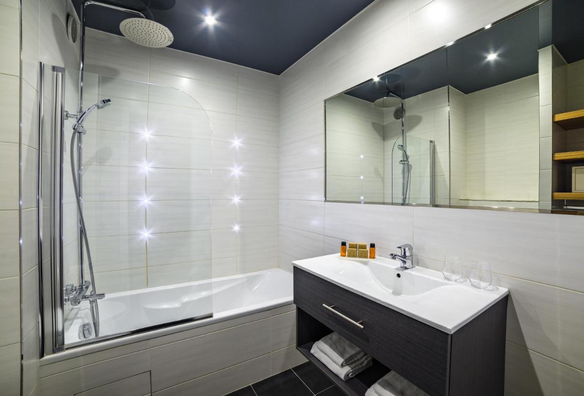 Salle de bains dans l'établissement Hotel Residence Europe & Spa