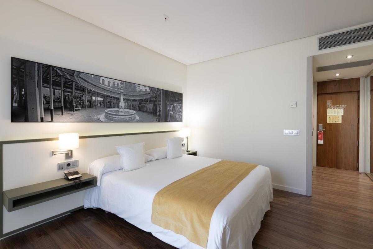 Cama o camas de una habitación en Primus Valencia