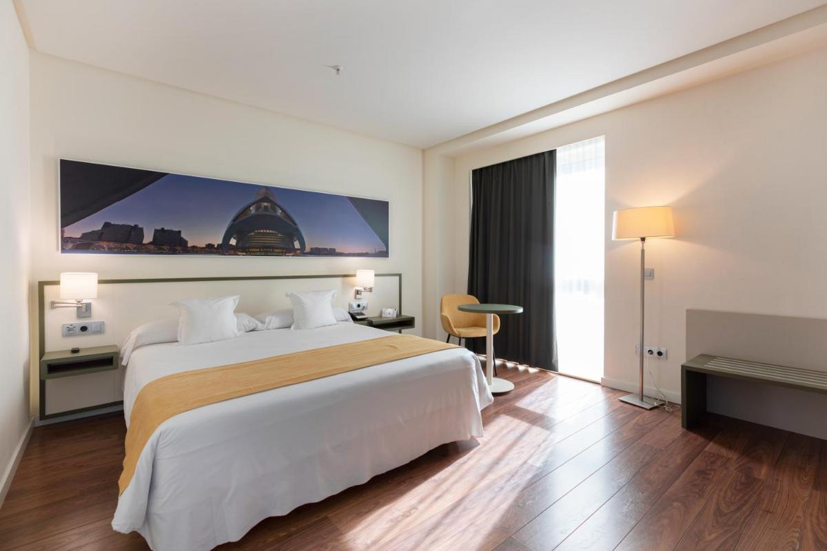 Cama o camas de una habitación en Primus Valencia