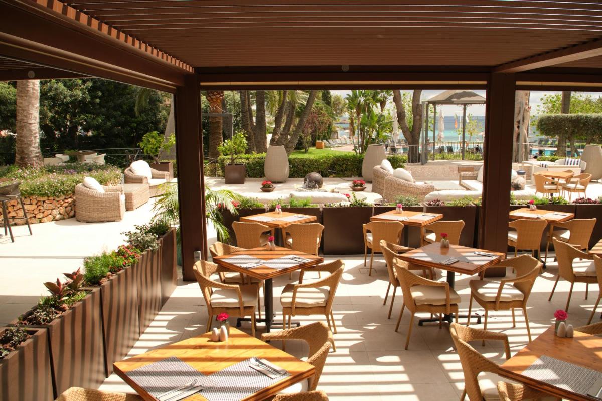 Un restaurante o sitio para comer en Hotel Son Caliu Spa Oasis