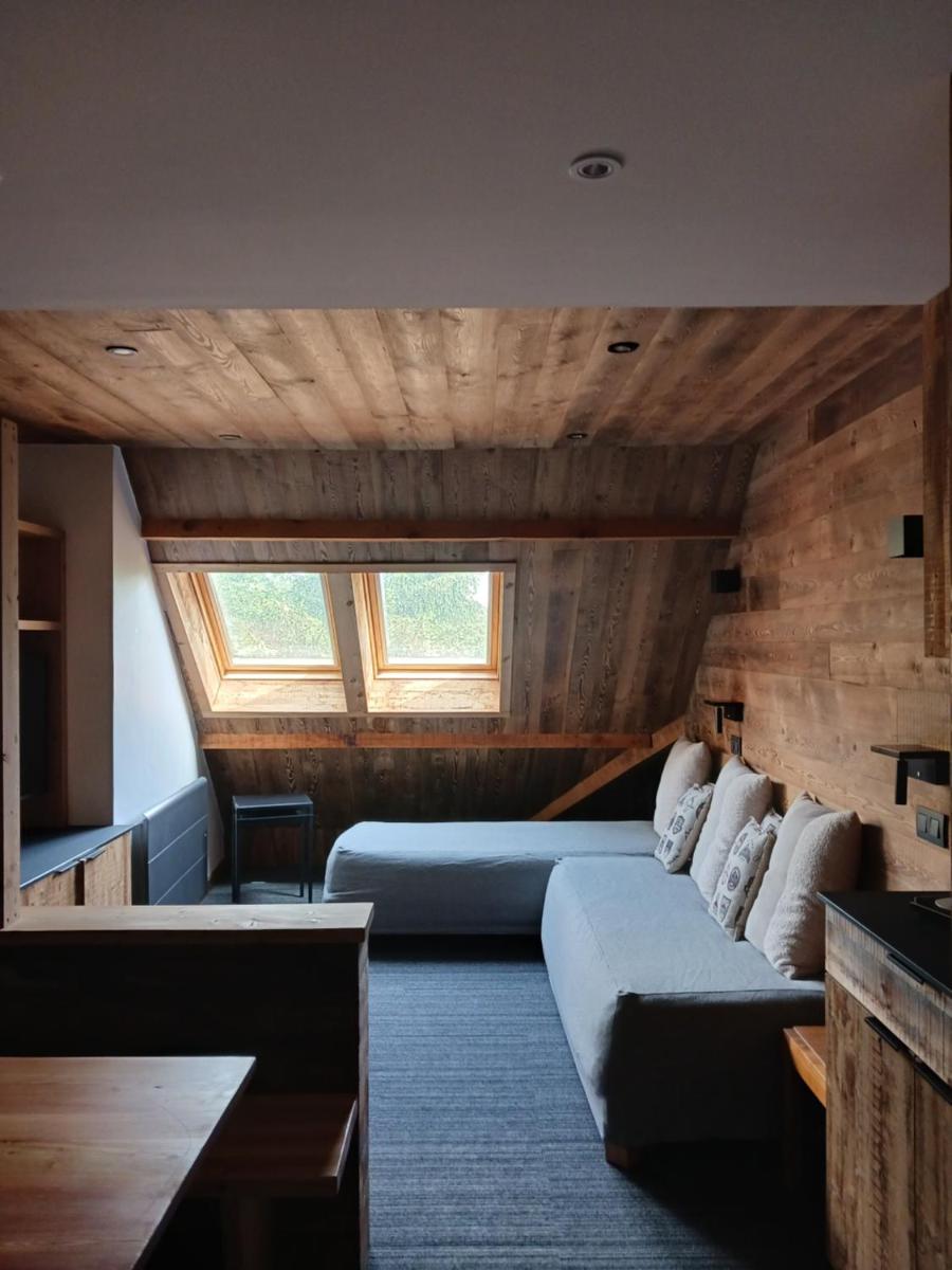 Un ou plusieurs lits dans un hébergement de l'établissement Alliey & Spa Piscine Appart-hôtel Serre chevalier