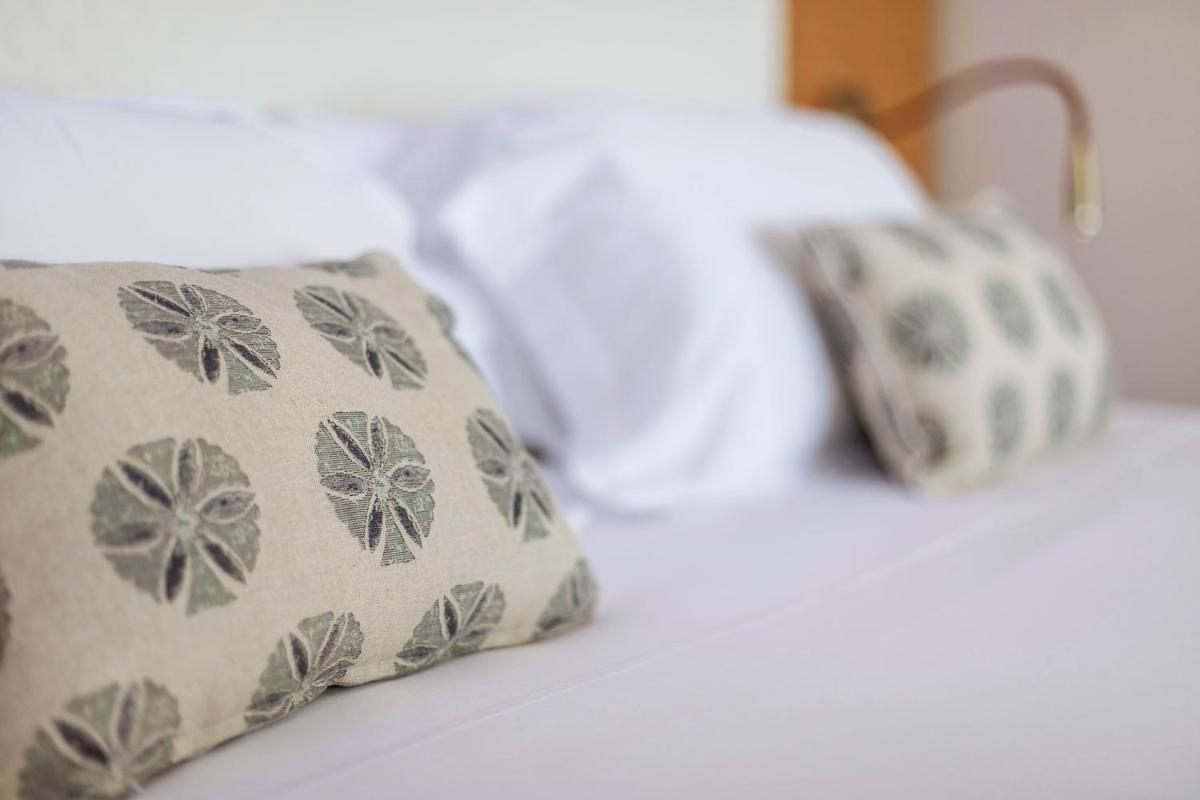 Cama o camas de una habitación en Melbeach Hotel & Spa - Adults Only