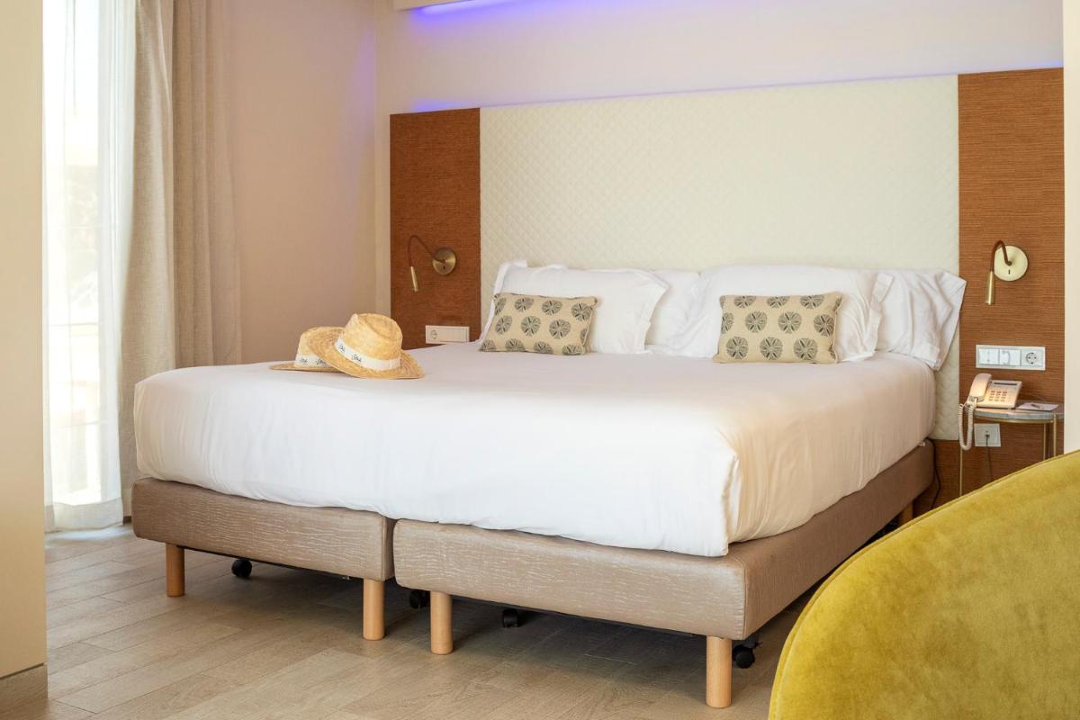 Cama o camas de una habitación en Melbeach Hotel & Spa - Adults Only
