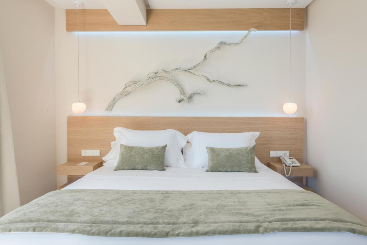 Cama o camas de una habitación en Melbeach Hotel & Spa - Adults Only
