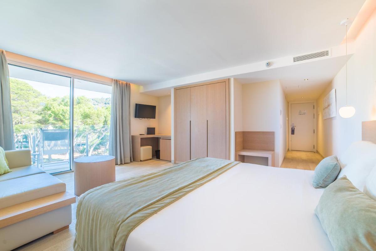 Cama o camas de una habitación en Melbeach Hotel & Spa - Adults Only