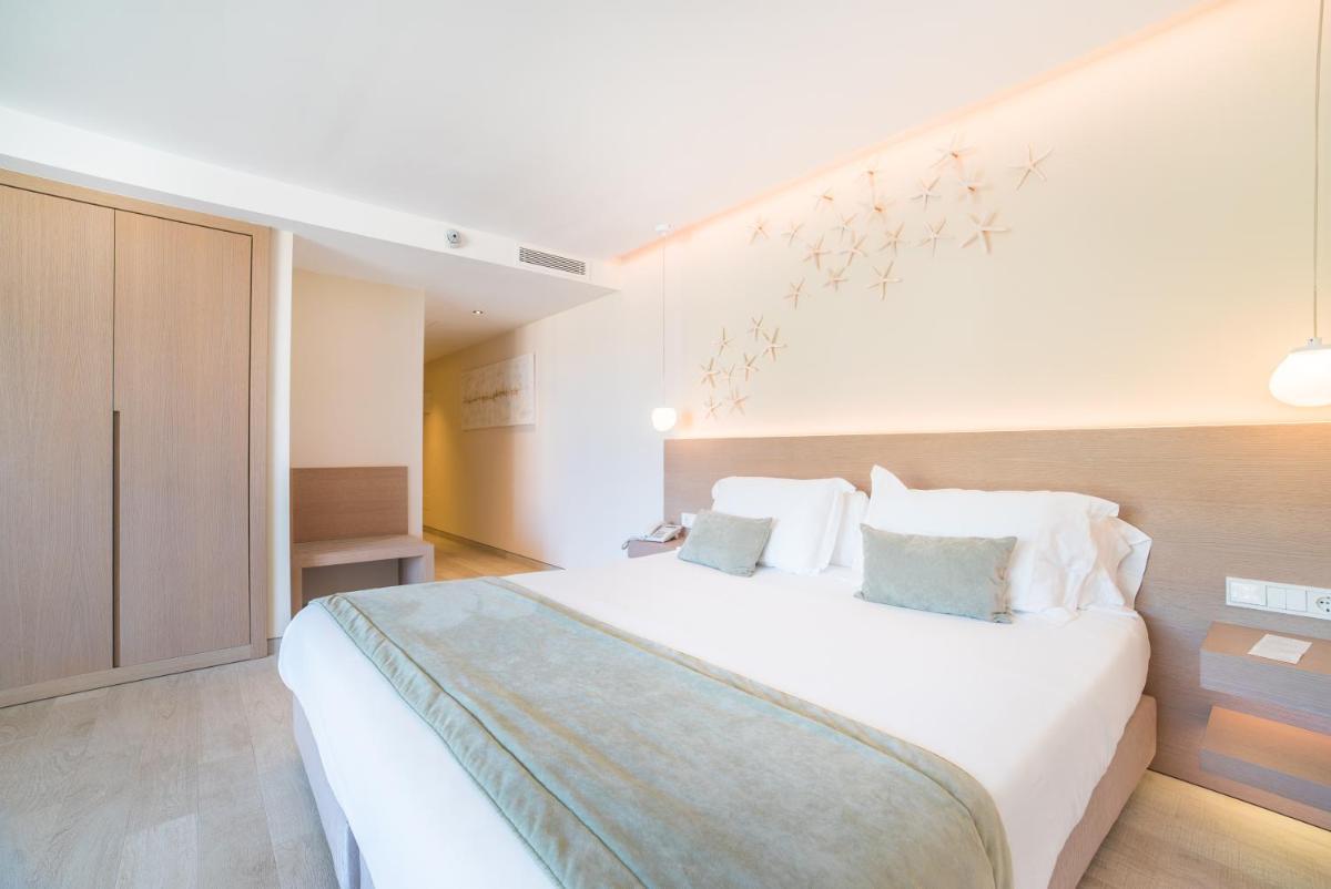 Cama o camas de una habitación en Melbeach Hotel & Spa - Adults Only