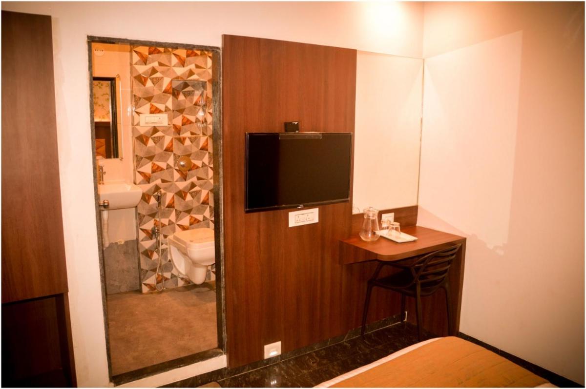 New Arvind Residency By Glitz Hotels - Housity