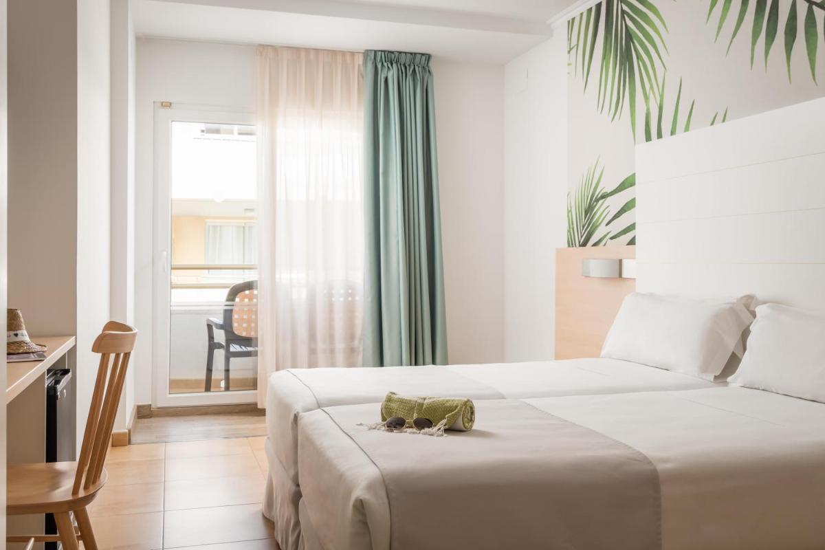 Cama o camas de una habitación en ALEGRIA Florida Park