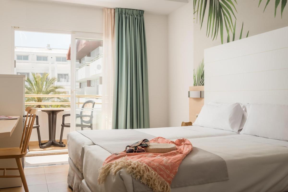 Cama o camas de una habitación en ALEGRIA Florida Park