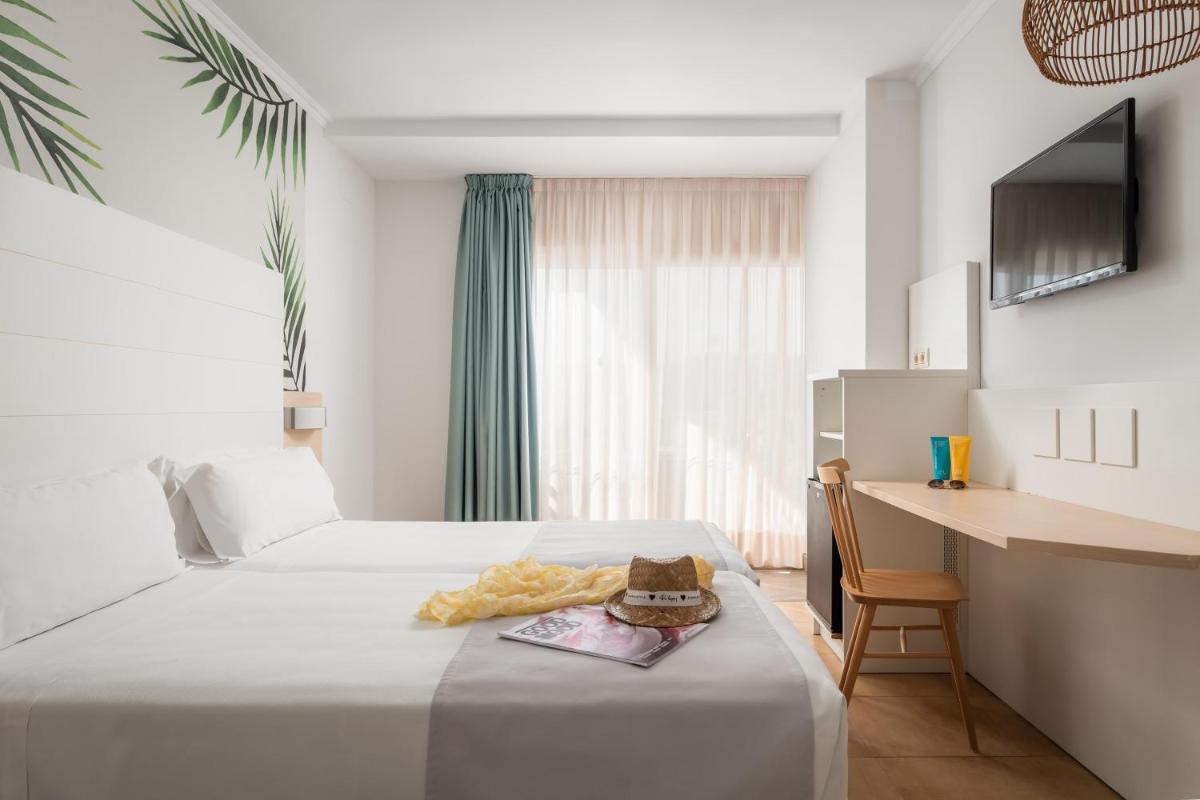 Cama o camas de una habitación en ALEGRIA Florida Park