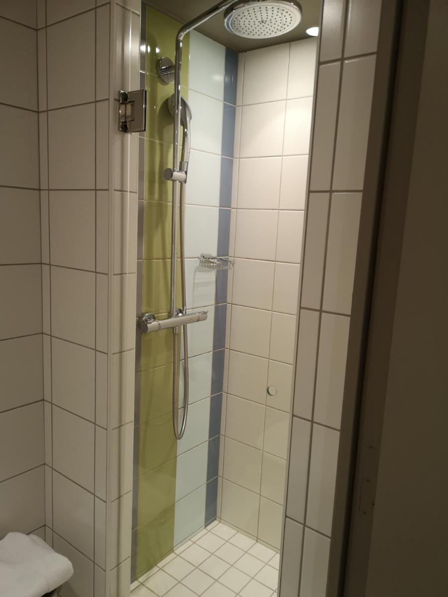 Salle de bains dans l'établissement Hotel le Cinq Hyper - Centre
