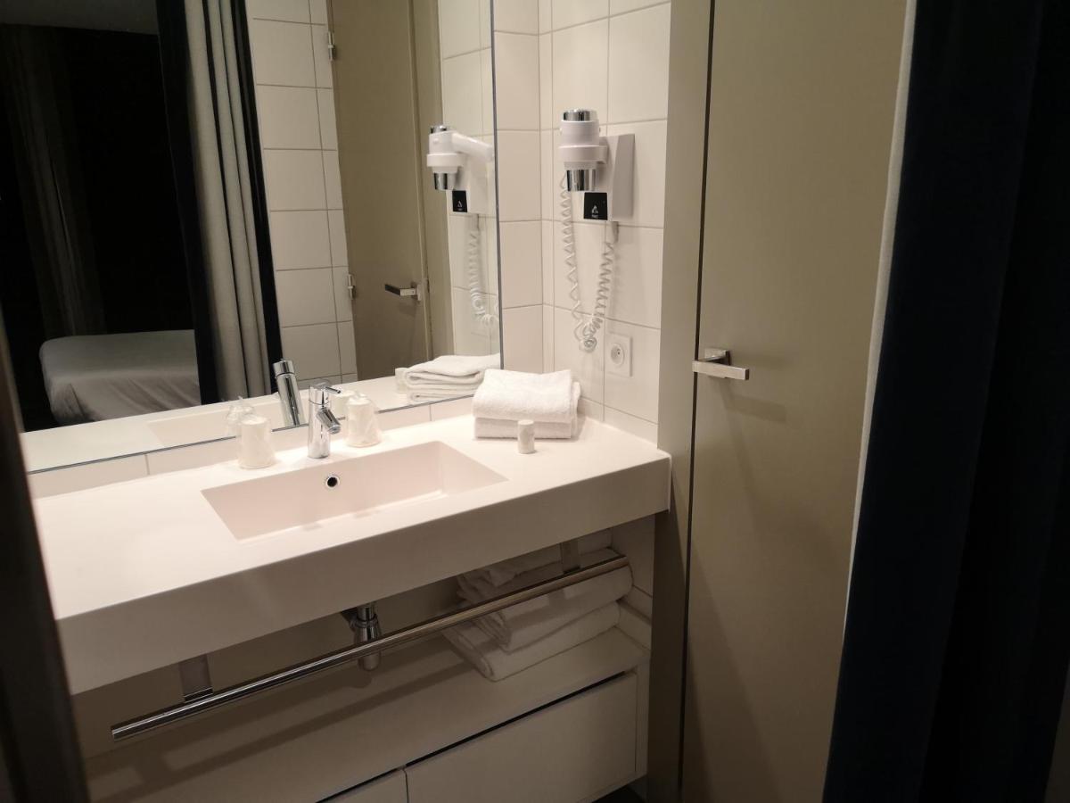 Salle de bains dans l'établissement Hotel le Cinq Hyper - Centre