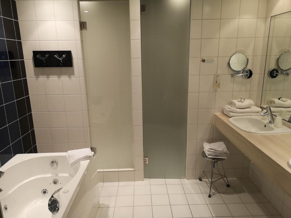 Salle de bains dans l'établissement Hotel le Cinq Hyper - Centre