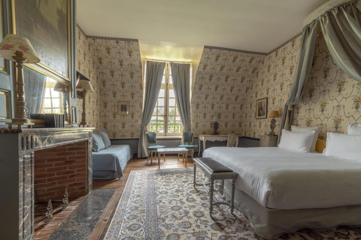 Un ou plusieurs lits dans un hébergement de l'établissement Le Château d'Etoges - Champagne