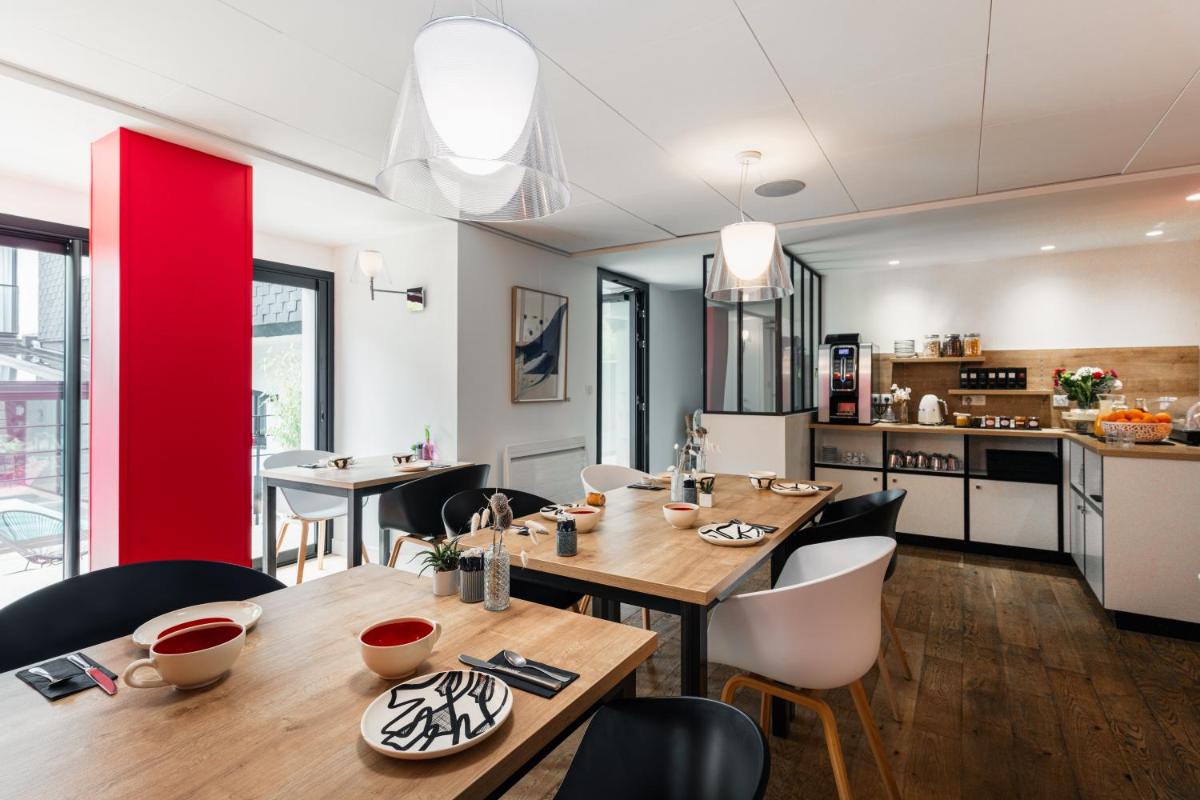 Cuisine ou kitchenette dans l'établissement Le Cornouaille Hotel & Spa
