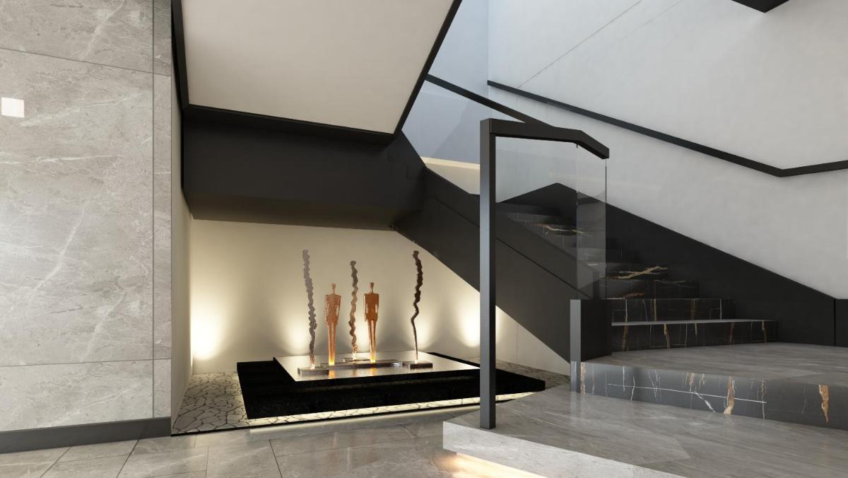 a staircase with a fireplace in a house at Hyatt Centric Hebbal Bengaluru in Bengaluru