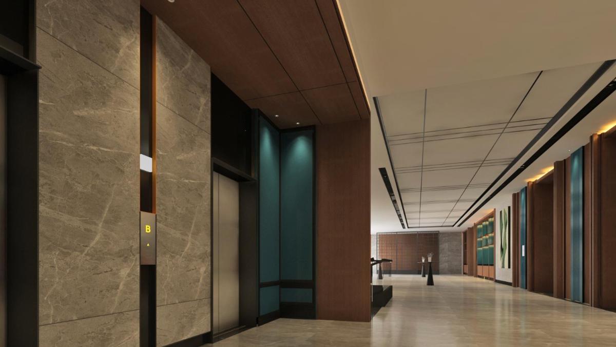 a hallway of an office building with a long corridor at Hyatt Centric Hebbal Bengaluru in Bengaluru